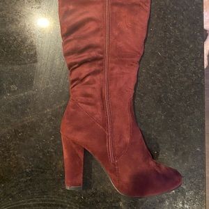 Wine knee high boots. New in box with no lid.